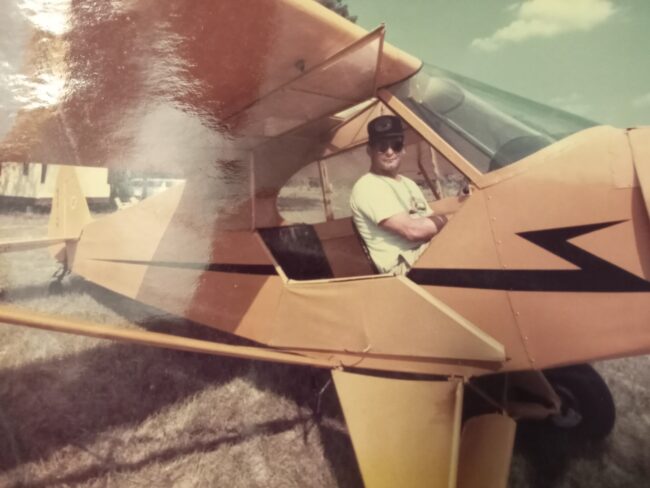 Rocky ready to take off in a J-3 Cub just like uncle Paul’s.
