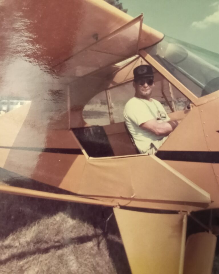 Rocky ready to take off in a J-3 Cub just like uncle Paul’s.