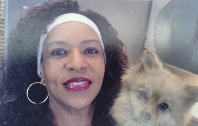 Gloria Riley with dog